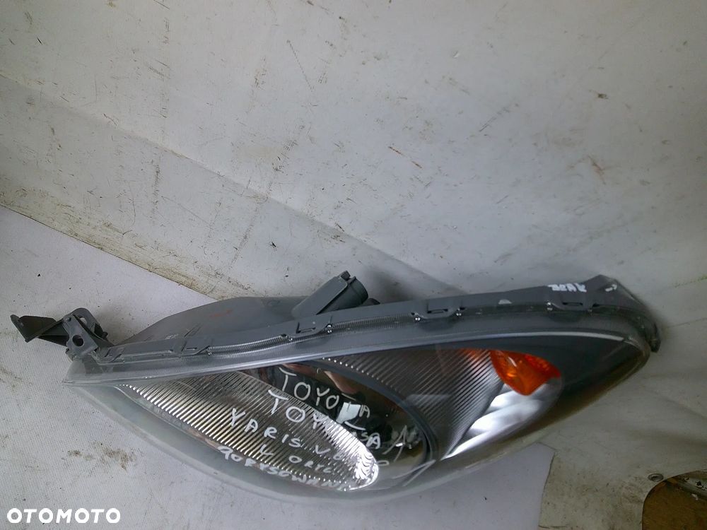 toyota yaris verso lampa przód lewa przednia nowa oryg - 7