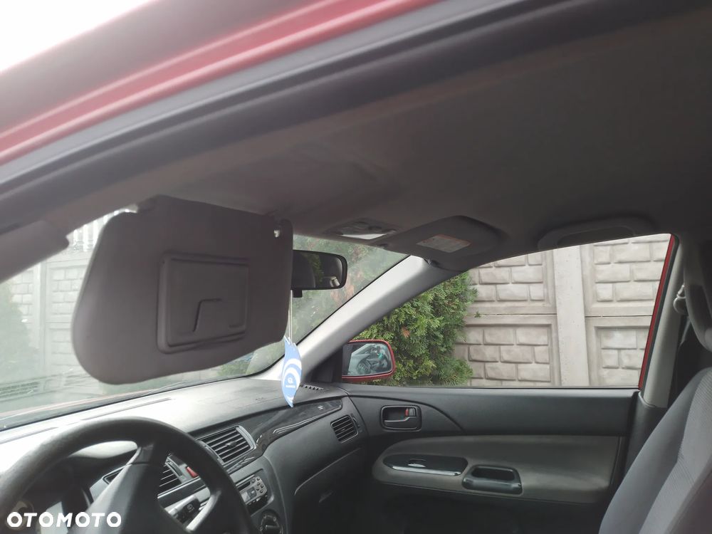 MITSUBISHI LANCER VII KOMBI 1.6 16V 03 - 08  OSŁONA PRZECIWSŁONECZNA PRAWA LEWA - 1