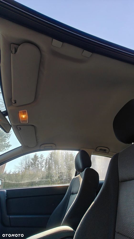 Opel Astra 1.8 Sport - 29