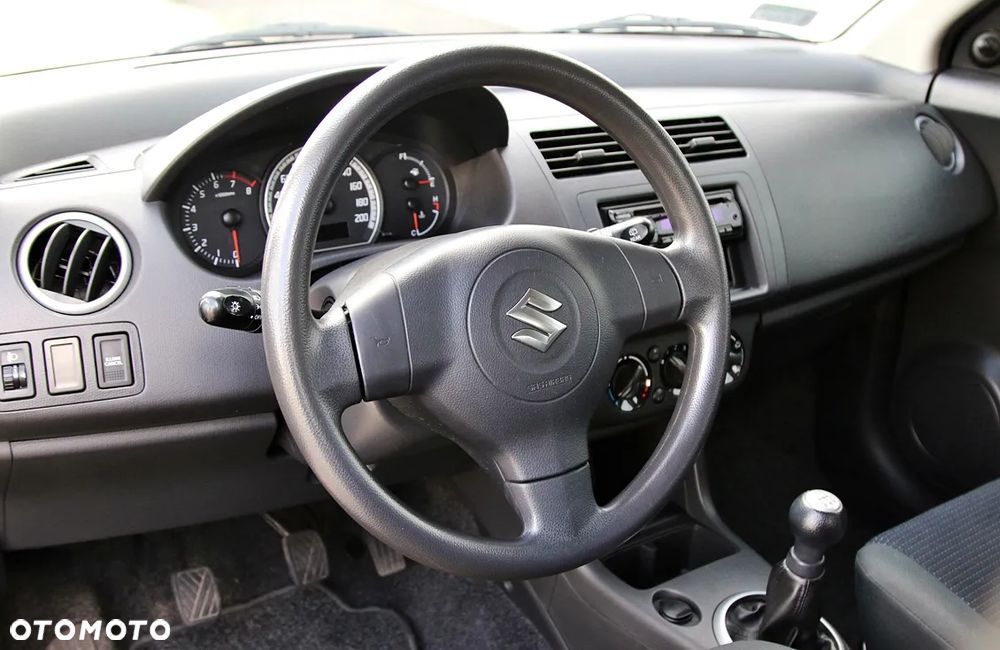 Suzuki Swift 1.3 GLX / Comfort - 12