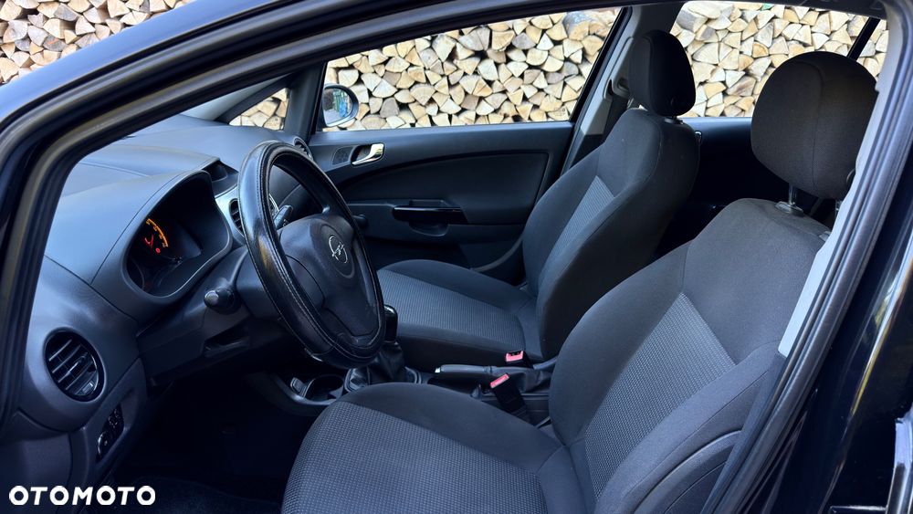 Opel Corsa 1.4 16V Active - 11