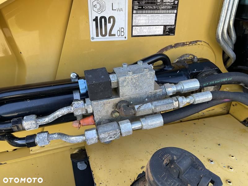 Caterpillar 428 F , rok 2012 4 łyżki, widły. - 9