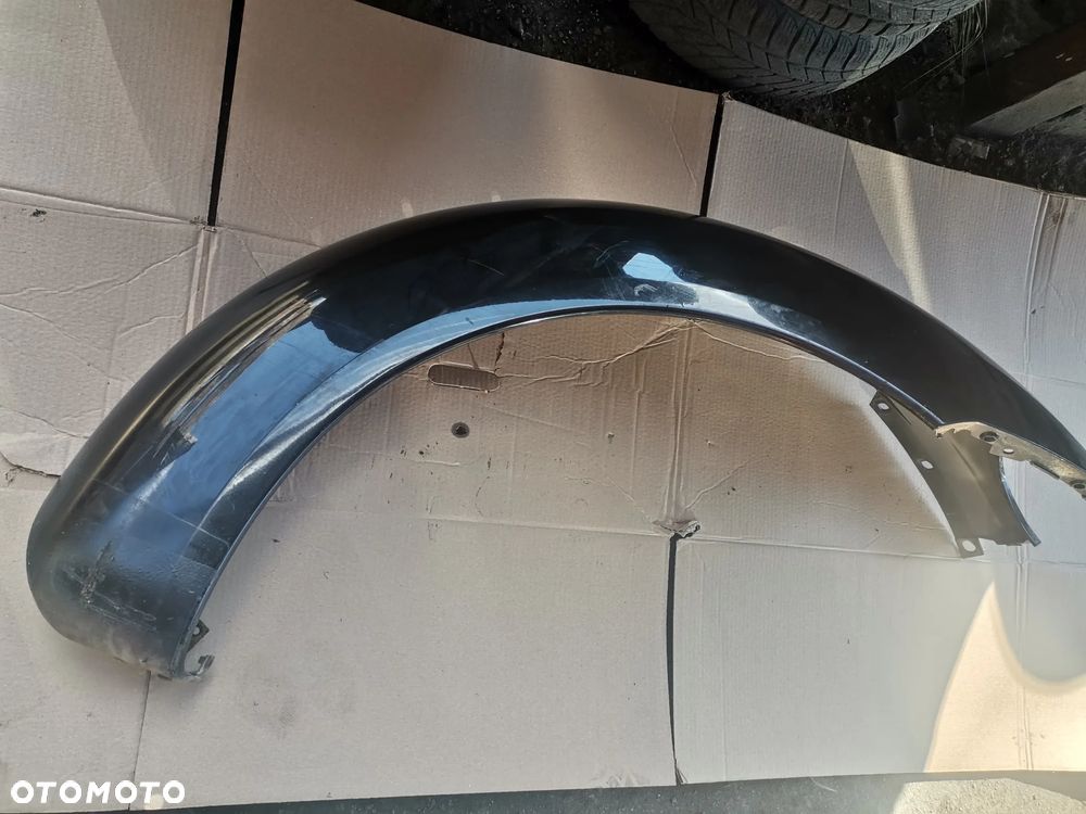 Blotnik lewy prawy tyl VW NEW BEETLE - 1