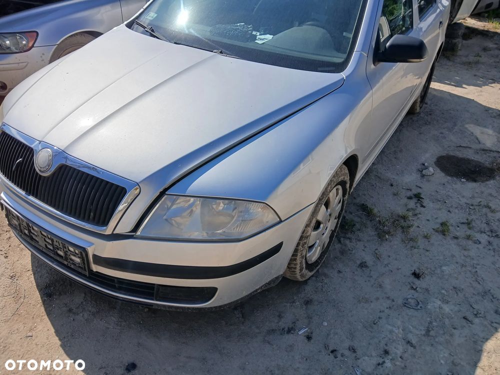 skoda octavia II 2 kombi LA7W fotel fotele kanapa deska kokpit podsufitka boczek boczki klamka - 1