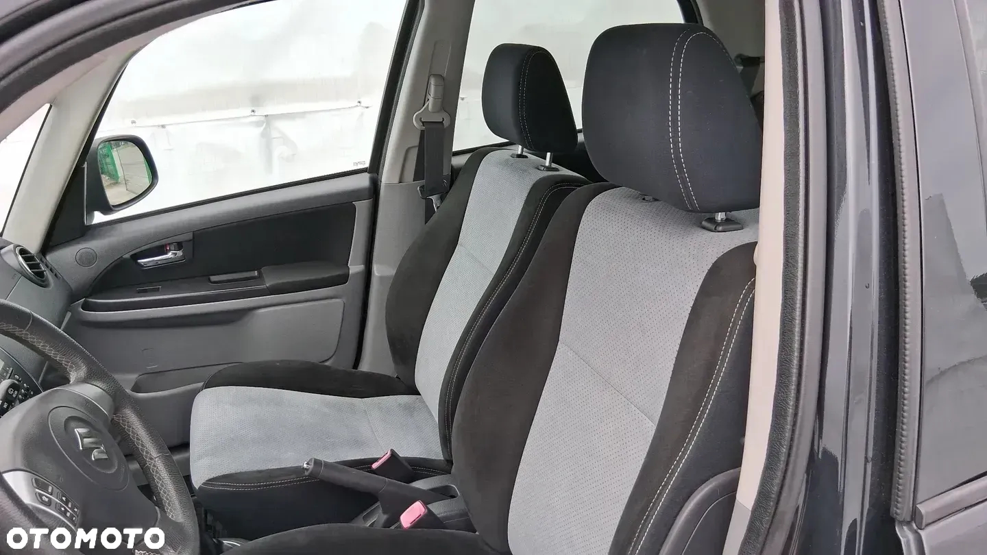Suzuki SX4 1.6 Comfort Plus - 13