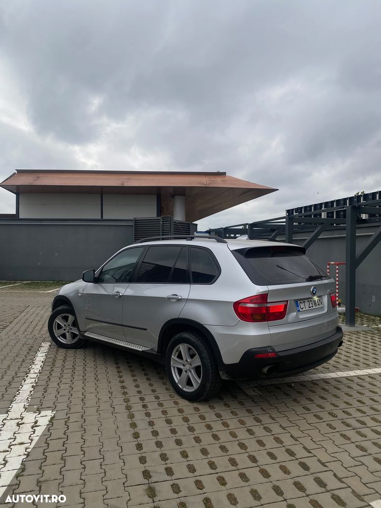 BMW X5 2009 — imagine 14