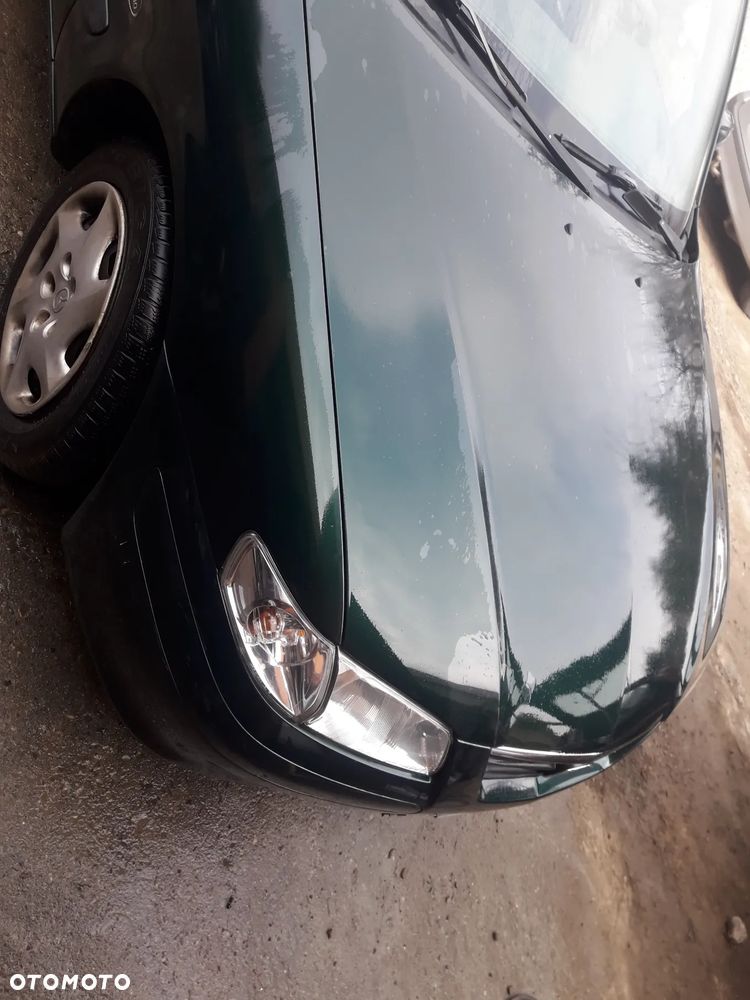 Mazda 626 GF GW 97-02 LIFT    Maska lampa zderzak pas atrapa 18J - 8