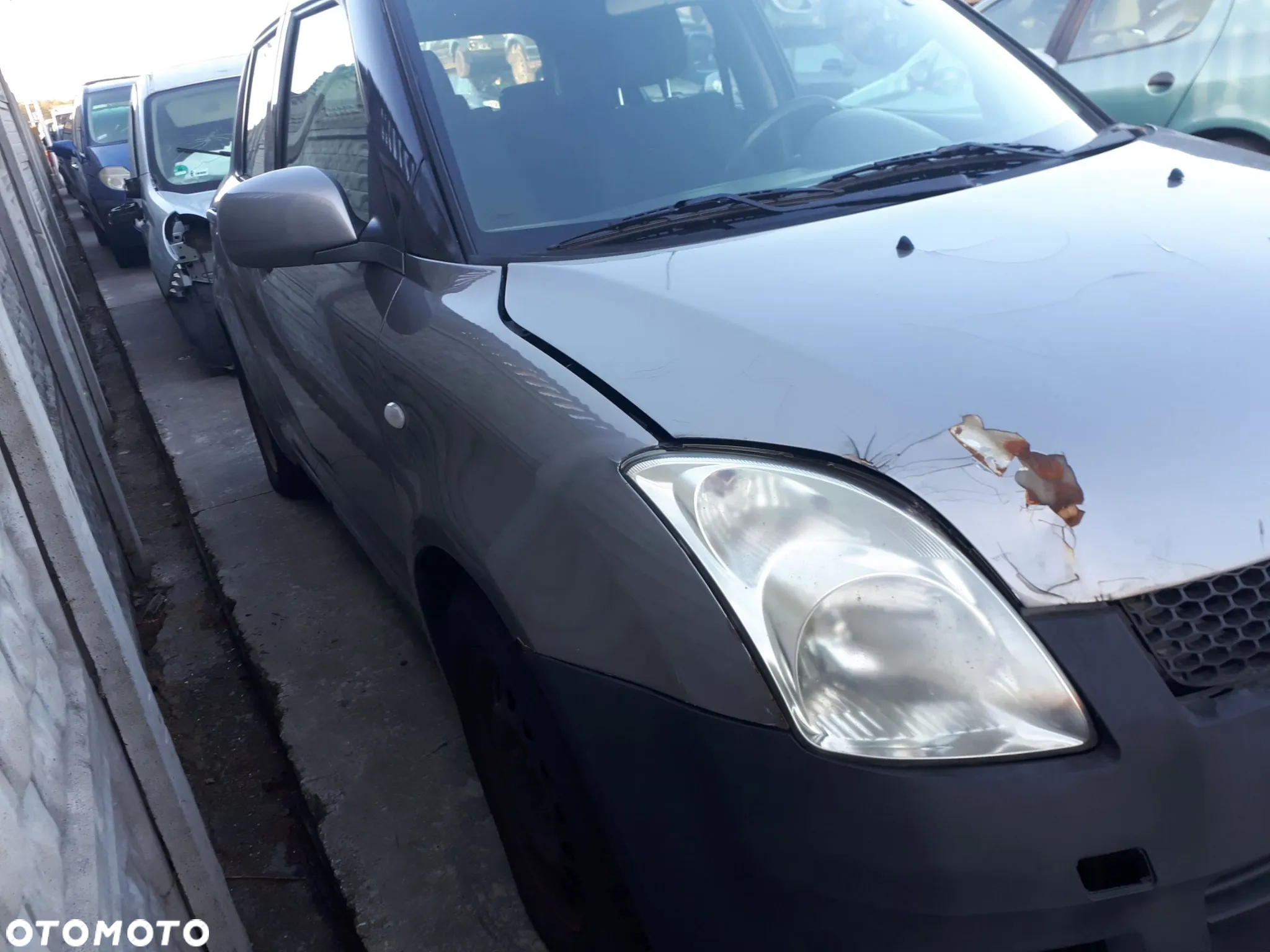 SUZUKI SWIFT 04-08 BŁOTNIK PRZÓD PRZEDNI PRAWY LEWY - 16