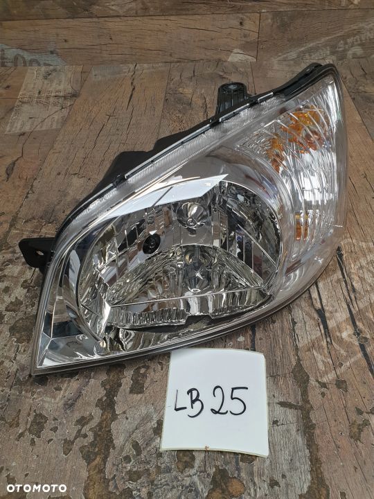 Oryginalna lampa lewa reflektor Hyundai Getz 92110-1C010 - 1