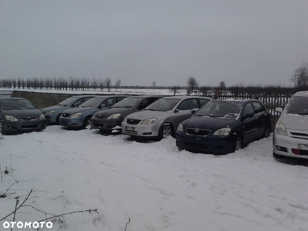Toyota Corolla E12 zacisk tył jarzmo PRAWE 1,8 TS - 9