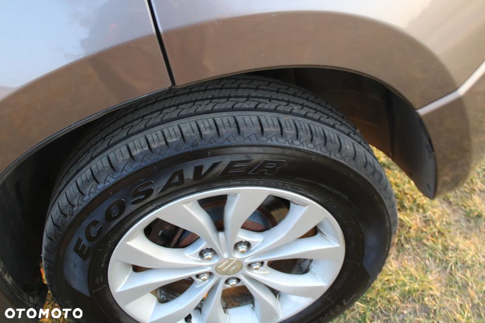 Suzuki Grand Vitara 2.4 Comfort Limited - 19