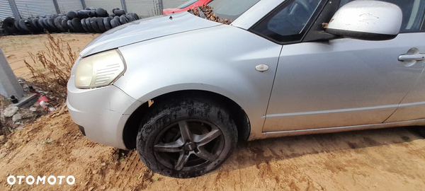 SUZUKI SX4 BŁOTNIK LEWY PRAWY PRZÓD PRZEDNI Z2S nr. 18/9