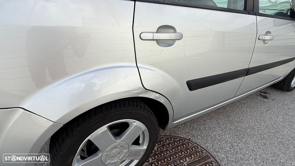 Ford Fiesta 1.4 TDCI Ghia - 14