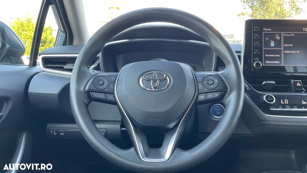 Toyota Corolla Sedan 1.8 HSD Business - 9
