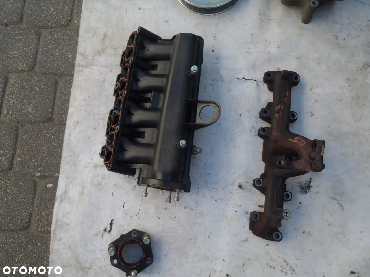 rozrusznik alternator sprężarka egr kolektor ssacy wydechowy silnik opel astra J corsa D Combo meriva B 1.3 ctdi - 24
