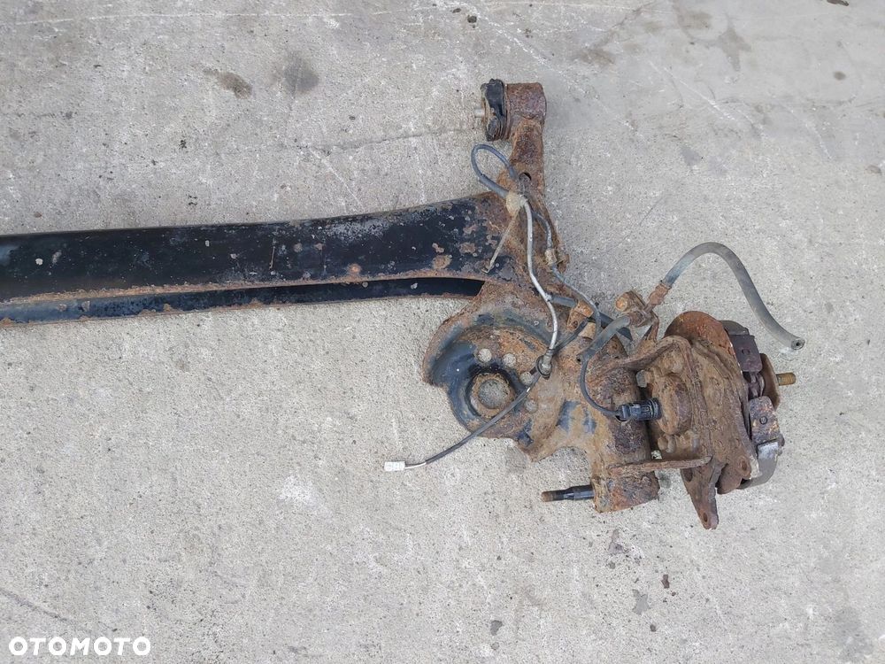 Toyota Yaris I belka zawieszenia tył bębny ABS pod TARCZE tarczobęben - 2