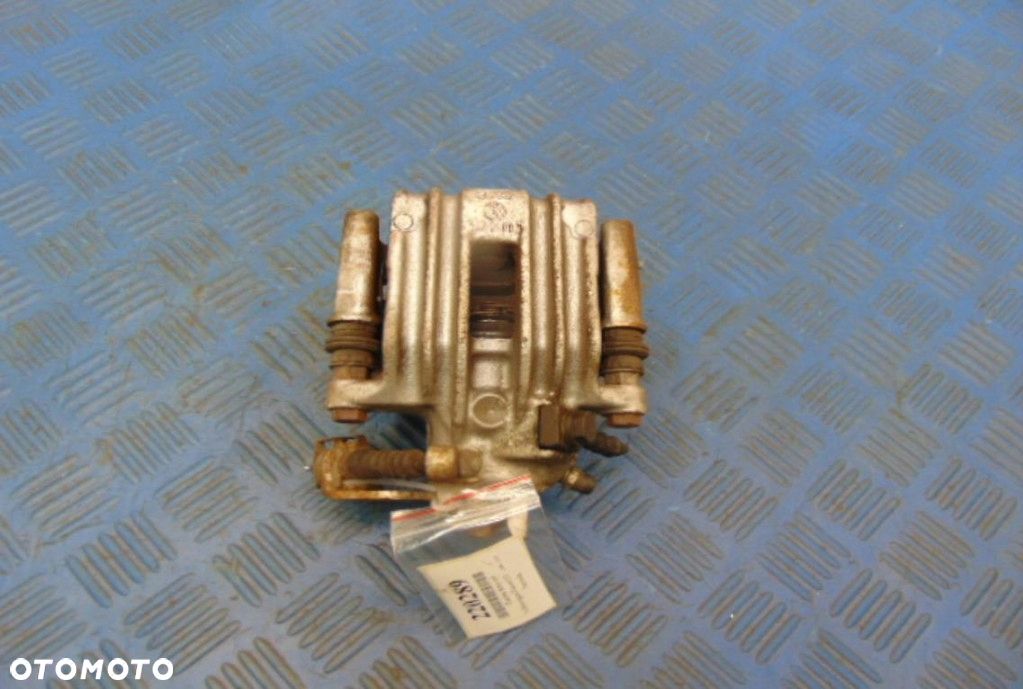 VOLKSWAGEN PASSAT B5 ZACISK HAMULCOWY LEWY TYŁ - 1