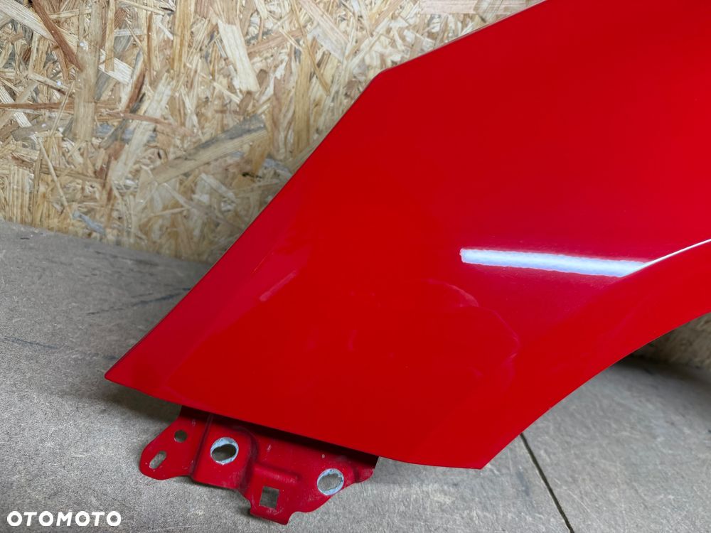 BŁOTNIK LEWY PRZÓD LEWY PRZEDNI OPEL CORSA E CZERWONY 50B - 16