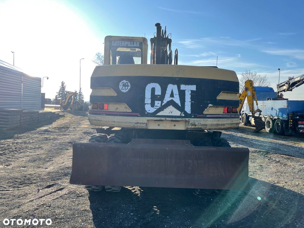 Caterpillar M312 - 4