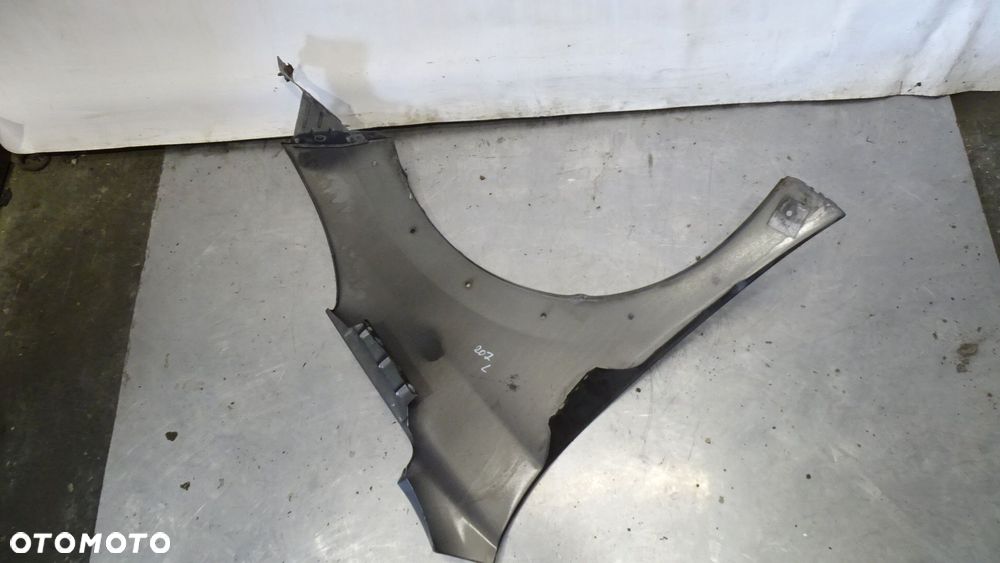 BŁOTNIK LEWY PRZEDNI PEUGEOT 207 1.6VTI SW KOL: KTQ - 5