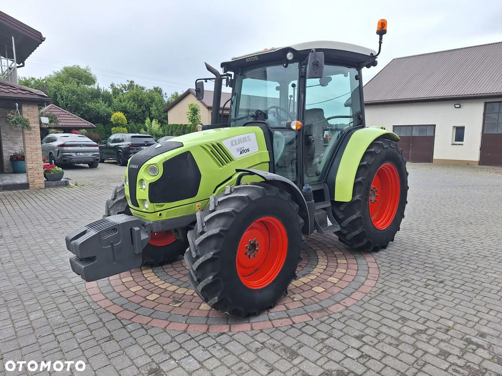 Claas Atos 330 - 1