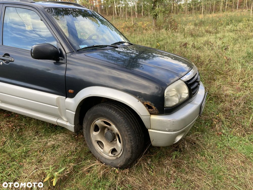Suzuki Grand Vitara 2.0 - 7