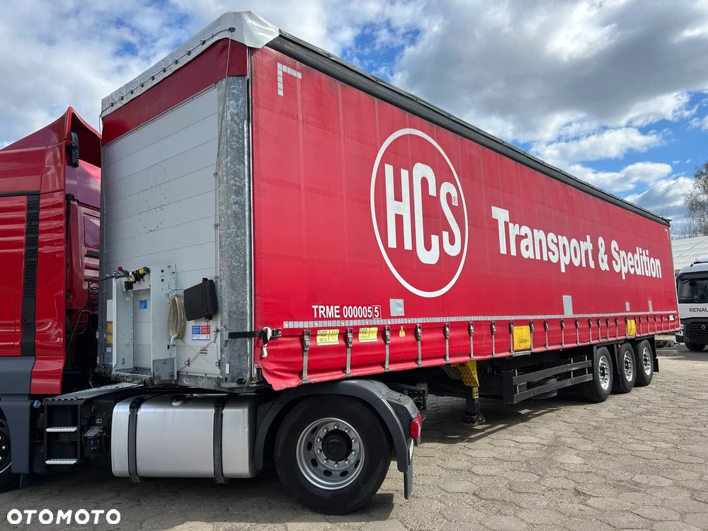 Schmitz Cargobull FIRANKA / 10 SZTUK / BARDZO ŁADNE OPONY / Z PEŁNYM WYPOSAŻENIEM DO ZAŁADUNKU / 2 KOŁA ZAPASOWE / DOSTĘPNE KOLORY SREBRNY - NIEBIESKI - CZERWONY / NIEKTÓRE MAJĄ NOWE PLANDEKI !! - 1