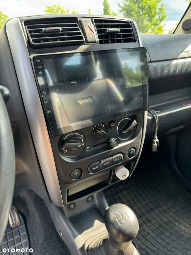 Suzuki Jimny 1.3 JLX / Comfort - 11