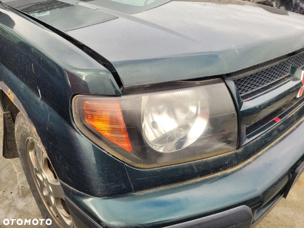 Lampa lewa prawa przód przednia Mitsubishi Pajero Pinin 2000r ciemna Europa - 3