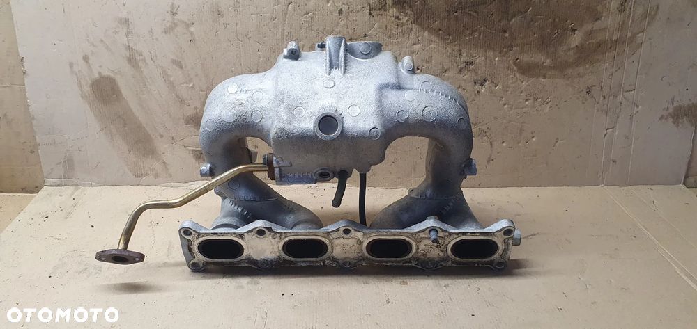 Kolektor ssący Suzuki Liana 1.6 16V E1T26571A - 5