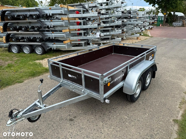 Inny Przyczepa VESTA LIGHT TANDEM 25WDA 251x135x39 cm 2 osie DMC 750 kg WYSOKIE BURTY ze sklejki spawana rama Kraków Targowisko MOTOMUS