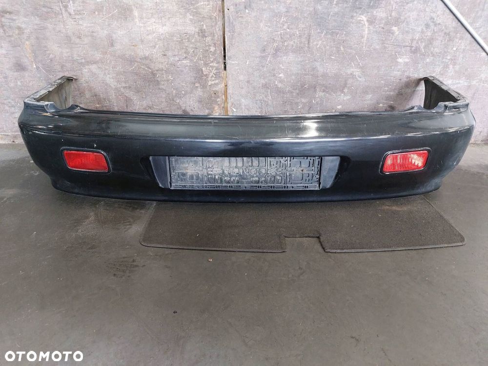 ZDERZAK TYŁ MITSUBISHI LANCER VII X42 - 1