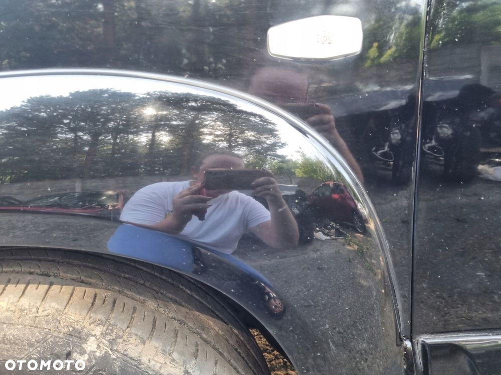 HYUNDAI TUCSON I 04-10 2007 r. EB BŁOTNIK LEWY PRZÓD LP Z LISTWĄ - 4