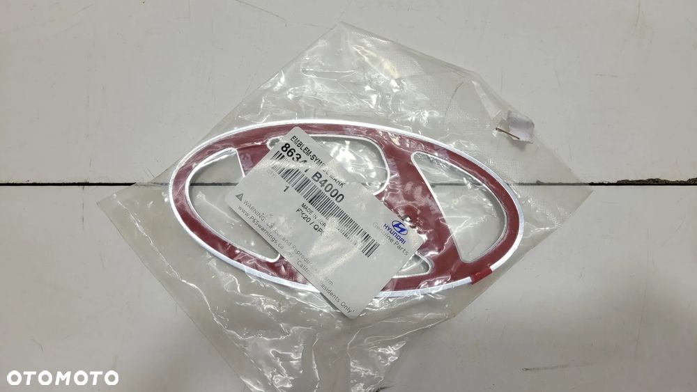 HYUNDAI i10 i20 emblemat logo tył 86341-B4000 - 2