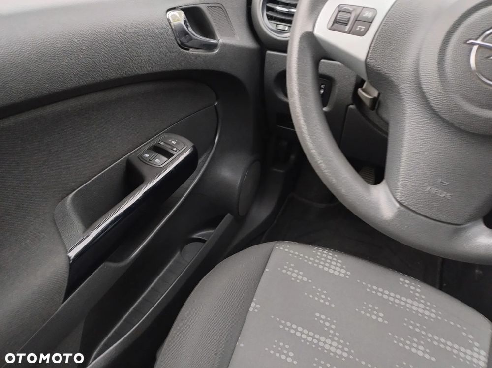 Opel Corsa 1.2 16V Enjoy - 23