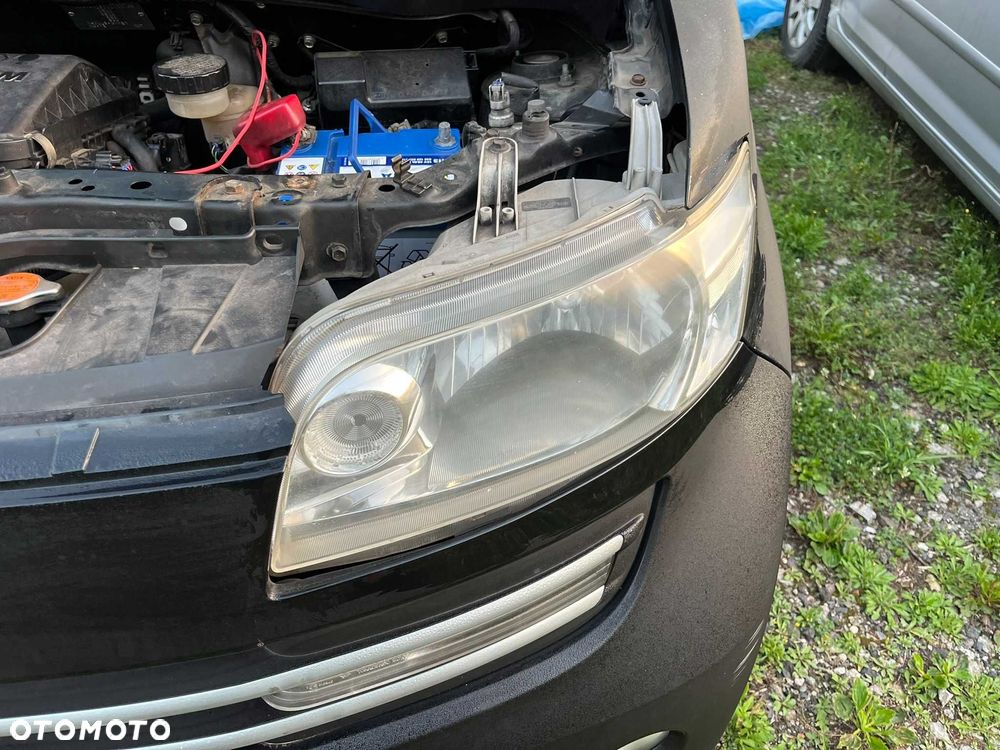 lampa przód przednia lewa daihatsu materia 2006 - 2011 europa cała - 2