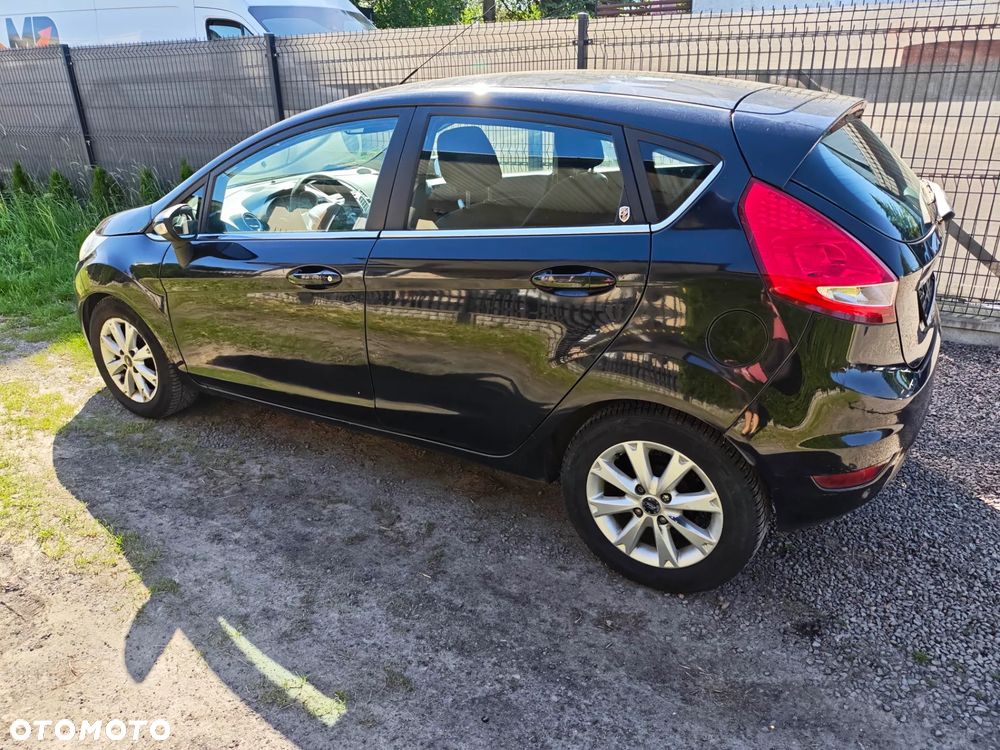 Ford Fiesta 1.4 Autom Ghia - 4