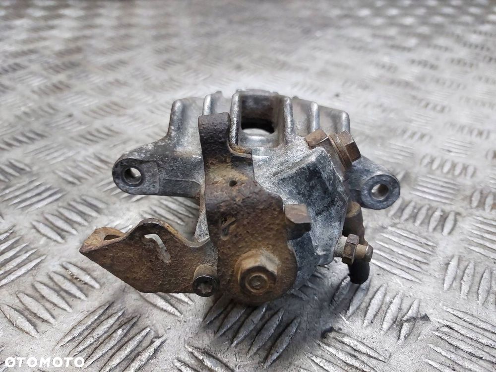 ZACISK HAMULCOWY LEWY TYŁ GOLF IV GOLF IV BORA I OCTAVIA I A3 8L LEON I - 2