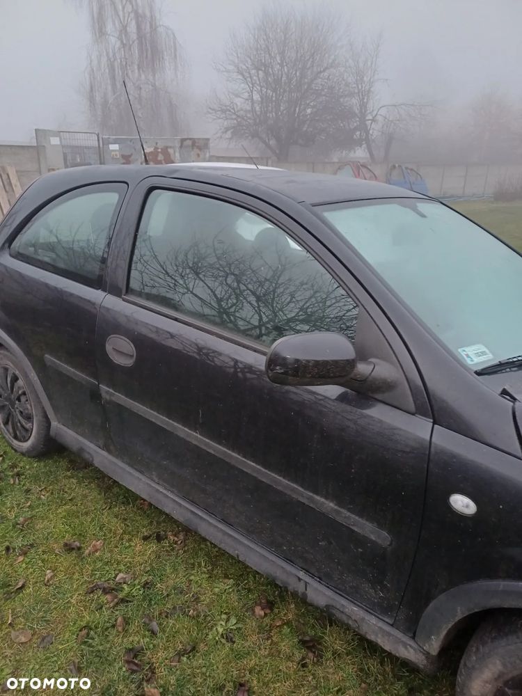 Drzwi lewe prawe 3 drzwiowe Opel Corsa C 2004r Z20R cala na części możliwa wysyłka - 4