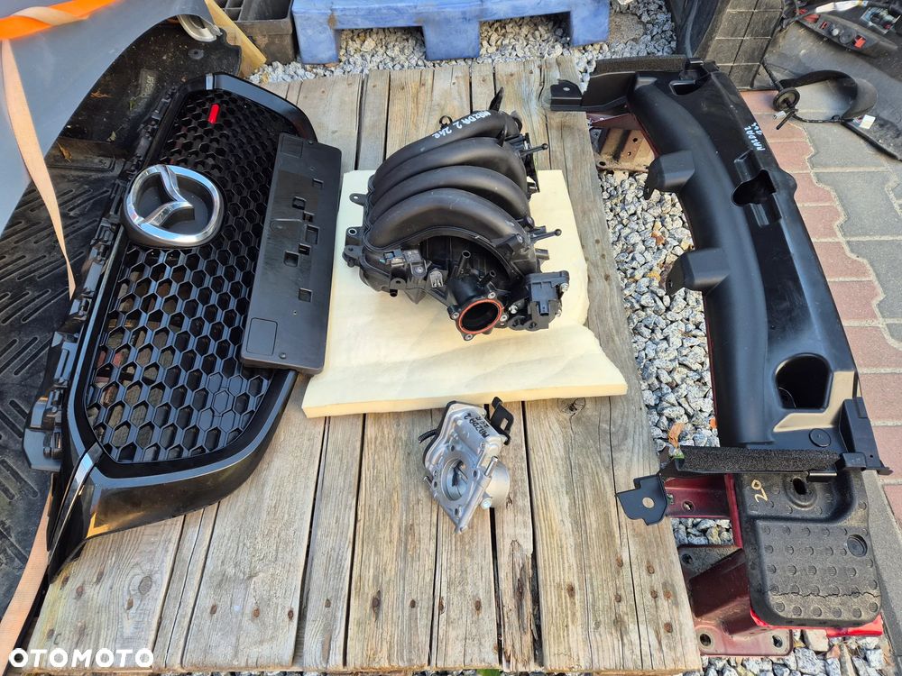 Grill Mazda 2 2015- 2025 części zderzaka DJ DL - 1