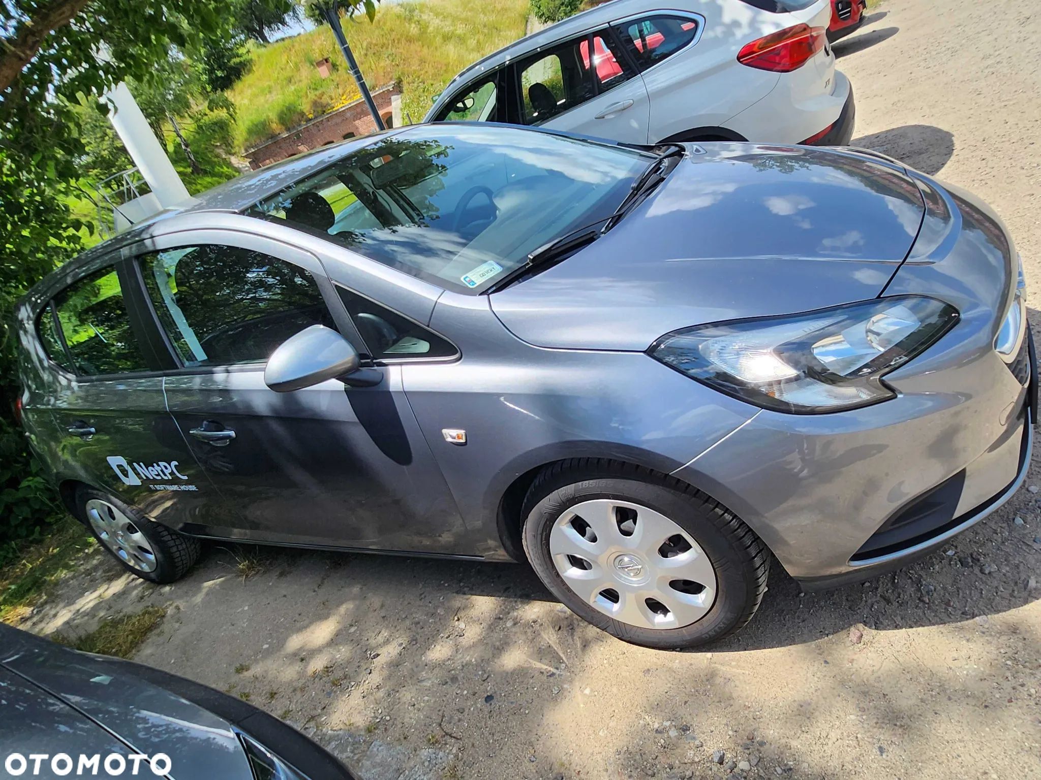 Opel Corsa 1.4 Enjoy - 1