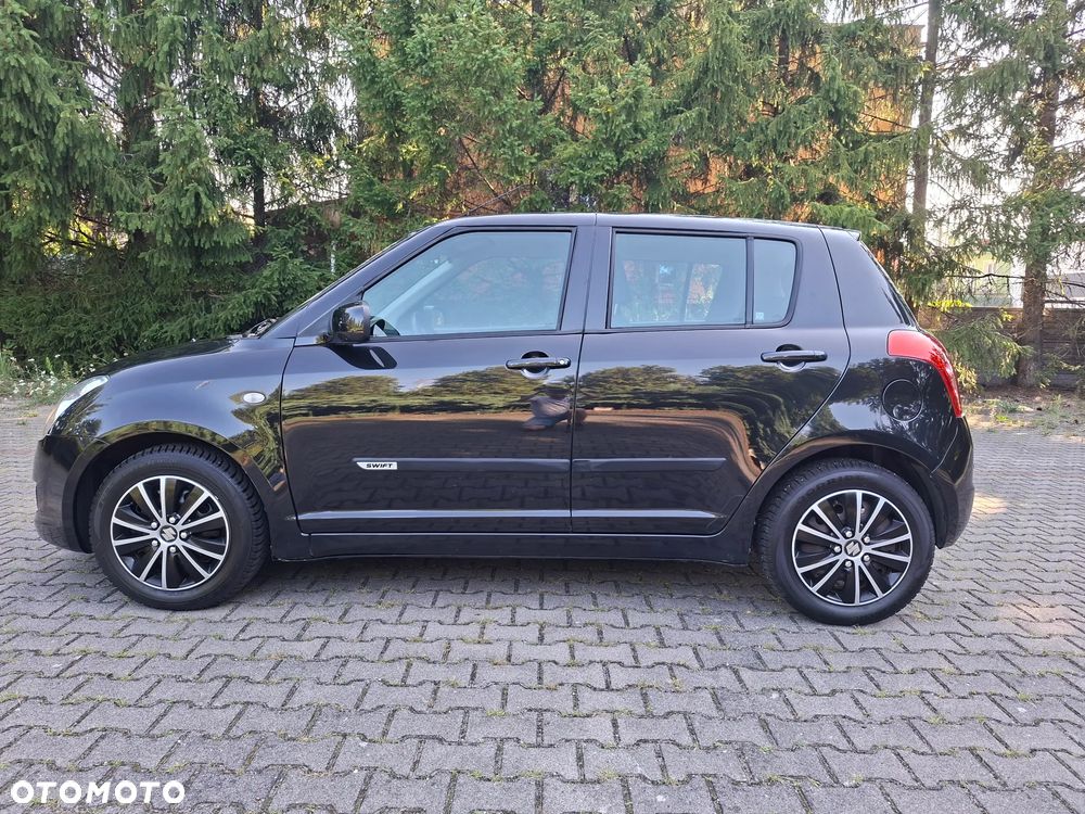 Suzuki Swift 1.5 GLX / Comfort - 8