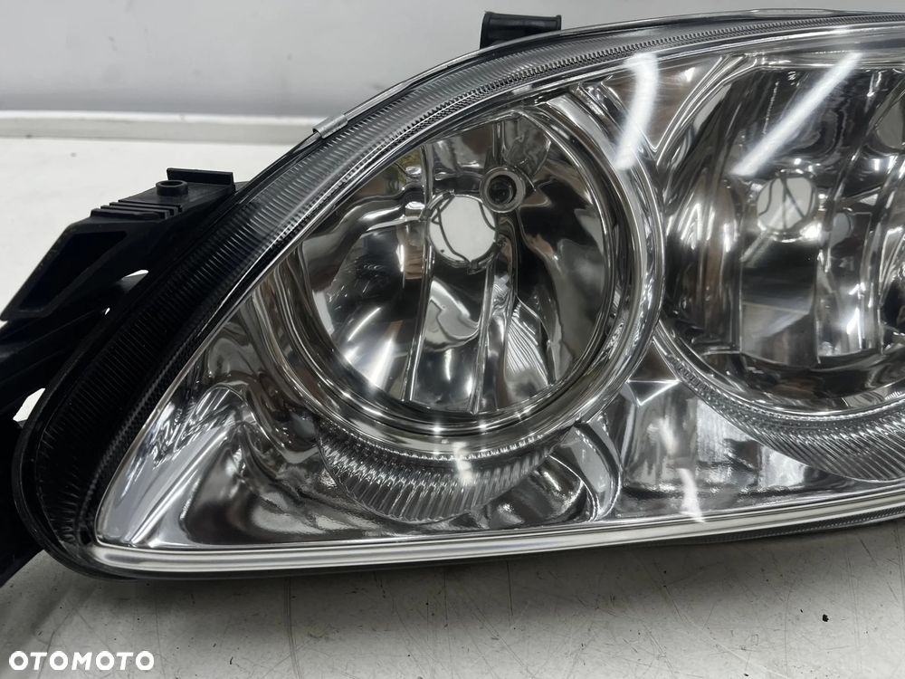 Lampa reflektor Toyota Avensis I T22 Lift 00-03r. NOWA lewa oryginał Europa jasna lewy przód 92101a2 - 4