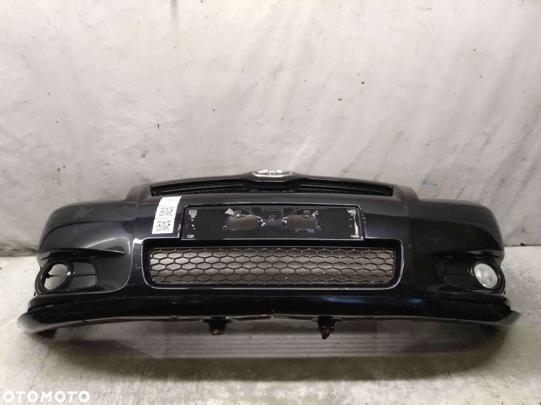 ^ ZDERZAK PRZÓD PRZEDNI DO TOYOTA COROLLA VERSO LIFT FL 209 CZARNY HALOGENY - 1