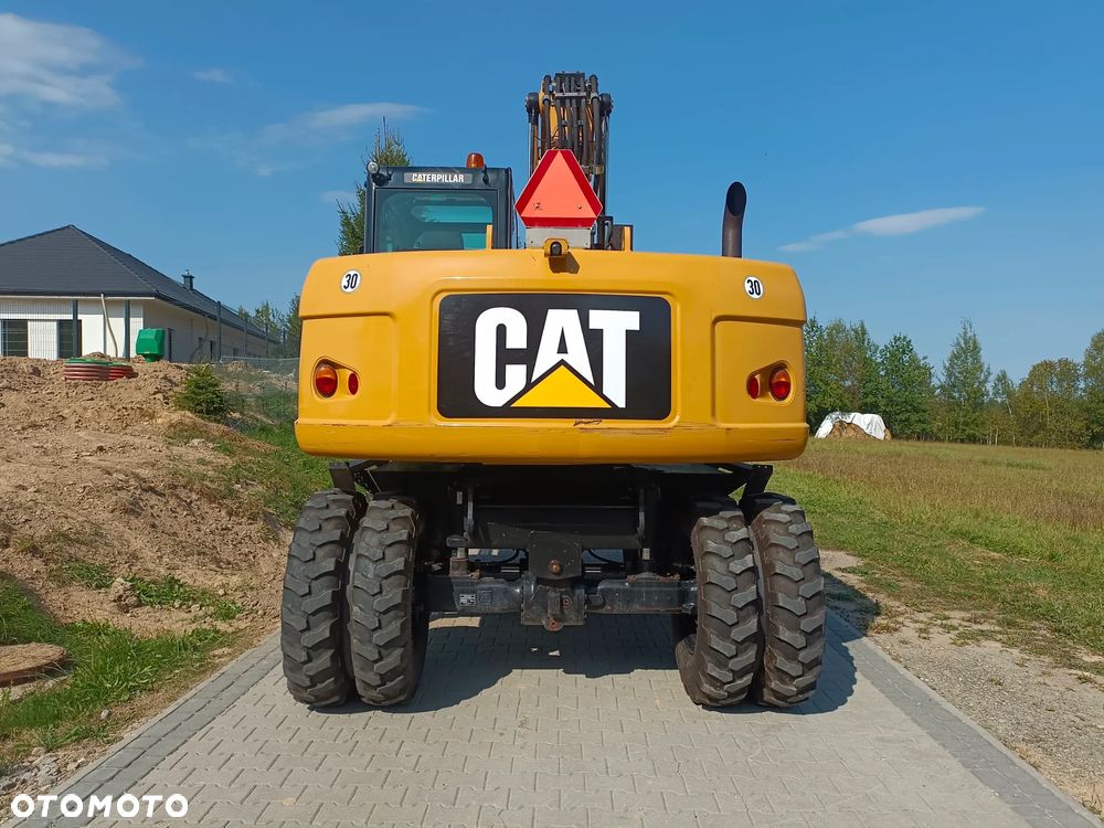 Caterpillar M313D - 16