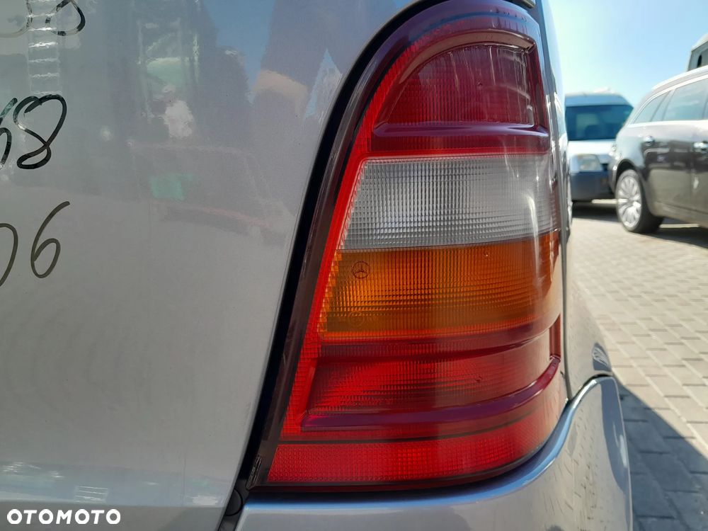 MERCEDES W168 LAMPA TYLNA PRAWA W BŁOTNIK - 1