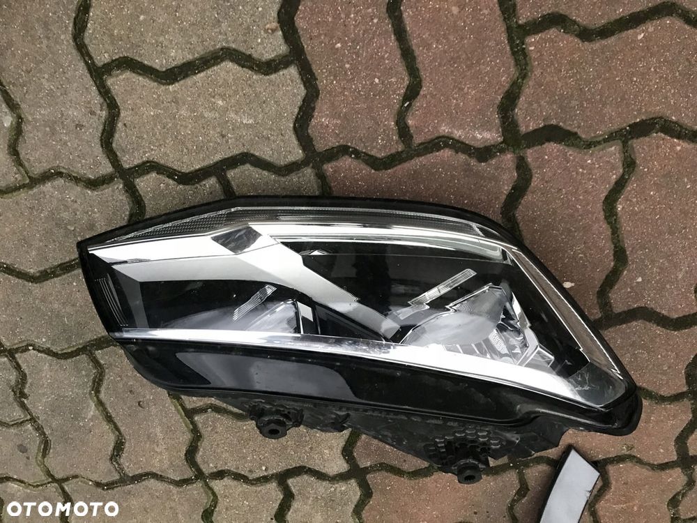 LAMPA VW CADDY 2K5 2015-19 REFLEKTOR ZWYKŁY CHROM - 1