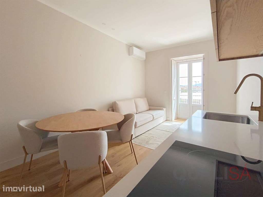 Apartamento T1+1 novo, equipado e mobilado, com varandas e lugar de... - Grande imagem: 5/24