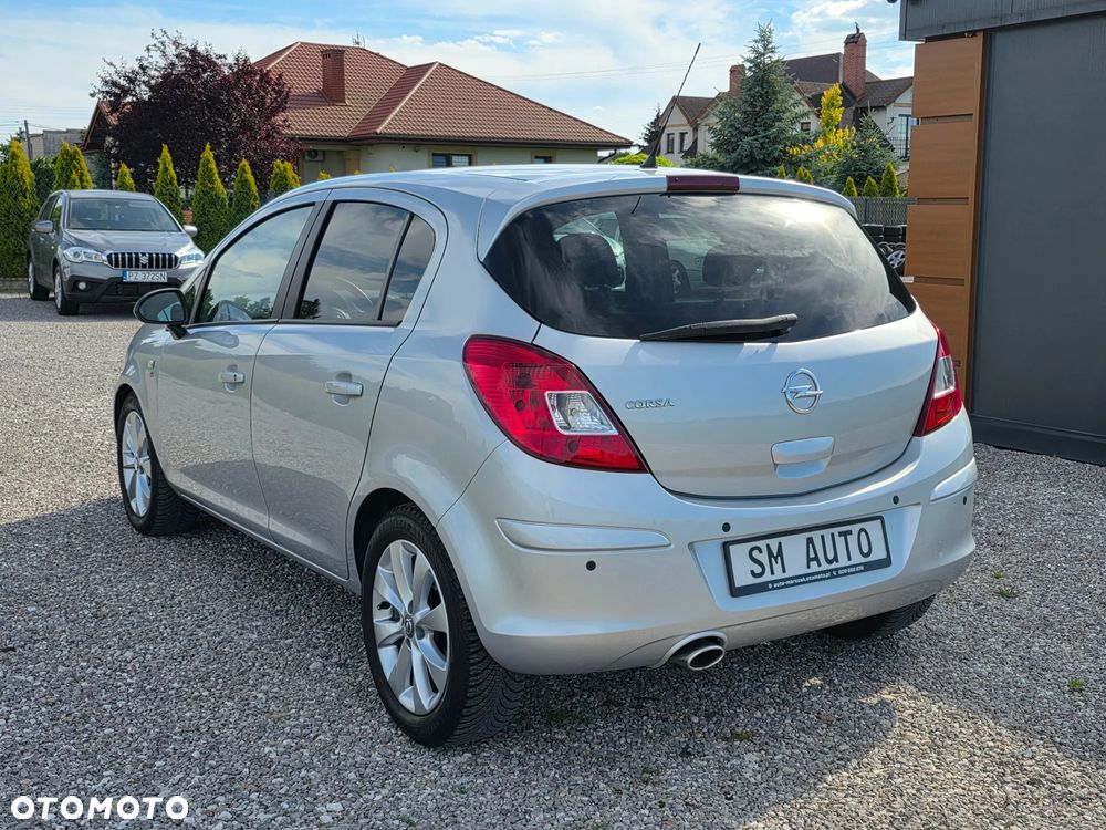 Opel Corsa 1.4 16V Cosmo - 8