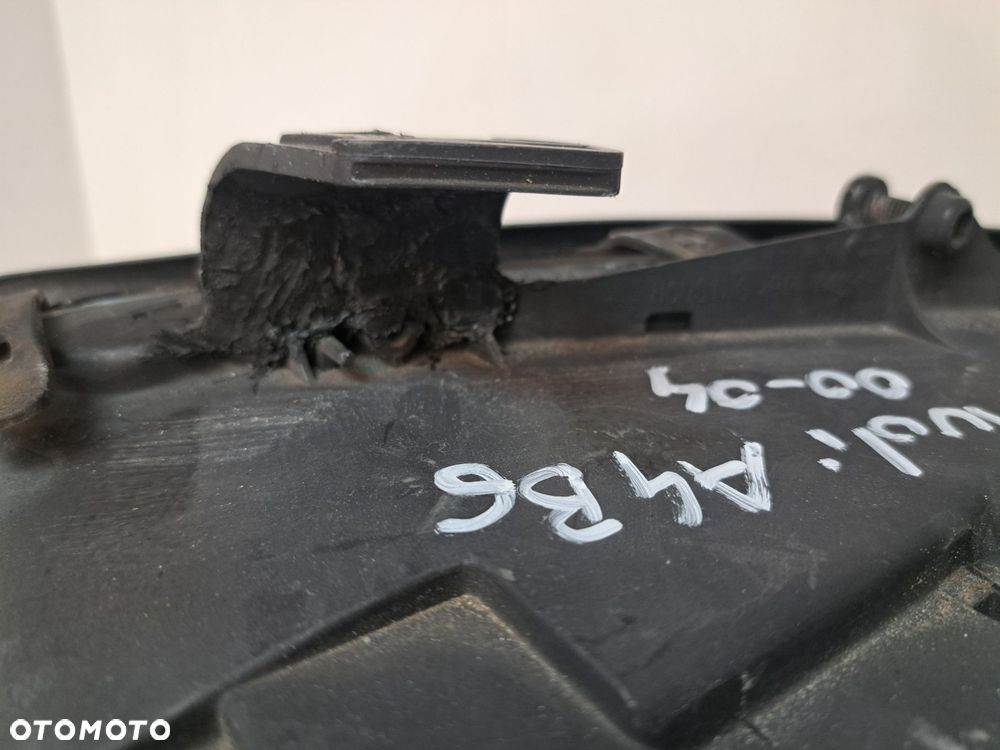 AUDI A4 B6 LAMPA PRAWA PRZÓD PRZEDNIA EU SOCZEWKA 8E0941004 00-04 - 14